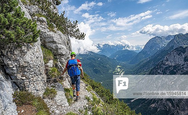 Young hiker  mountaineer on the Sentiero Carlo Minazio path  view of the Valle di San Vito  Sorapiss circuit  Dolomites  Belluno  Italy  Europe