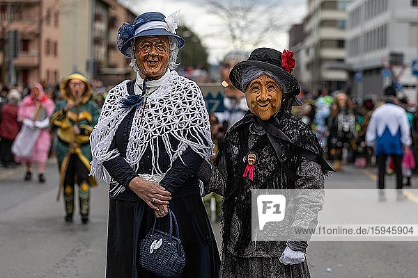 People masked as a pair of witches from Kriens at the carnival parade of the Mättli Guild in Littau  Lucerne  Switzerland  Europe