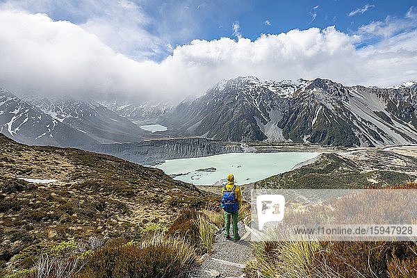 Hiker on trail  views of the Hooker Valley from the Sealy Tarns Track  glacial lakes Mueller Lake and Hooker Lake  Mount Cook National Park  Canterbury  South Island  New Zealand  Oceania