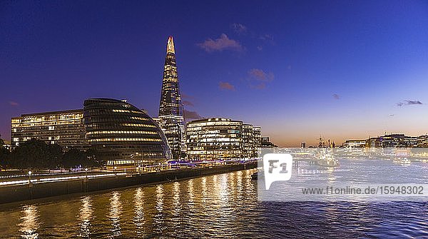 River Thames and modern high-rise buildingss  More London Riverside in the evening  The Shard and Greater London Auditory  London  England  Great Britain