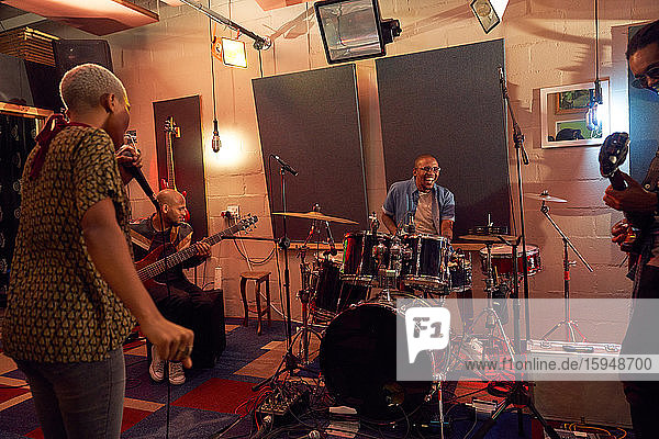 Musicians practicing in recording studio