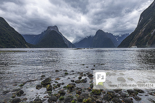 New Zealand  Southland  Storm clouds over scenic coastline of Milford Sound