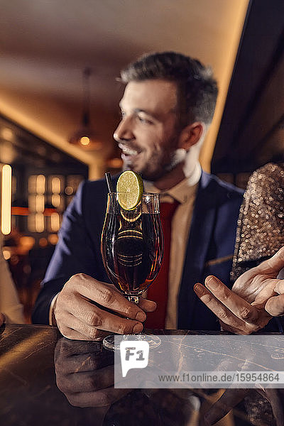 Man having a cocktail in a bar