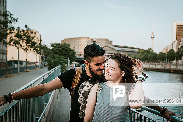 Happy young couple at River Spree  Berlin  Germany