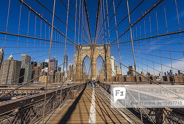 Brooklyn Bridge  back left Skyline of Lower Manhattan  Manhattan  New York City  New York  USA  North America