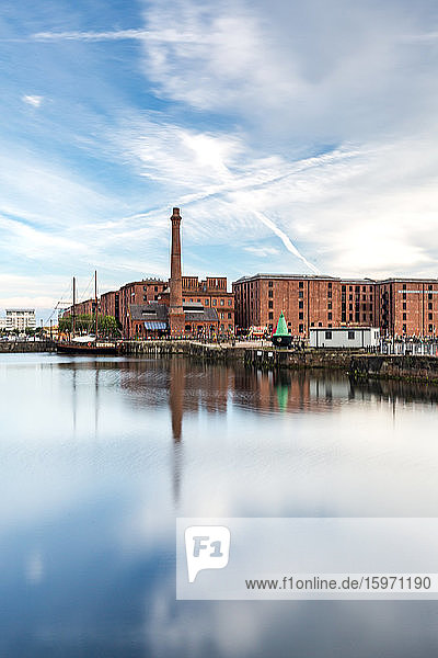 The Pump House pub and Albert Dock buildings reflected in a still Canning Dock. Liverpool  Merseyside  England  United Kingdom  Europe