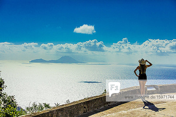 Woman taking in the captivating view at the top of Saba Island  Netherlands Antilles  West Indies  Caribbean  Central America