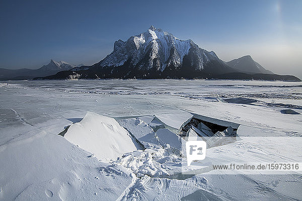Ice fracture at Abraham Lake frozen with Mount Michener  Alberta  Canada  North America