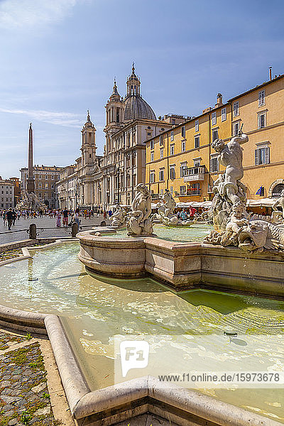 View of the Neptune Fountain and colourful architecture in Piazza Navona  Piazza Navona  UNESCO World Heritage Site  Rome  Lazio  Italy  Europe