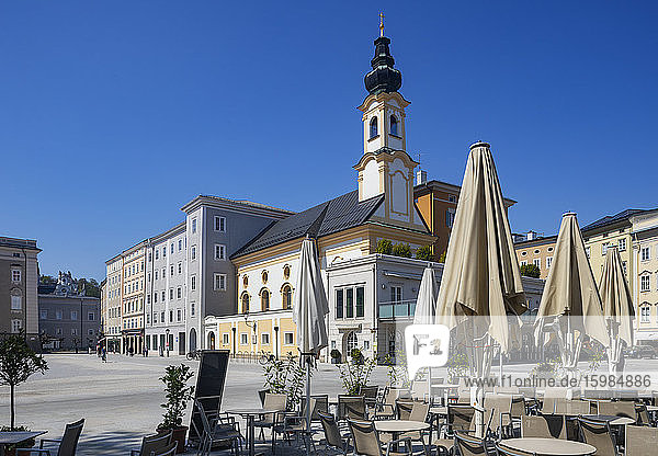Austria  Salzburg  Empty Residenzplatz with St. Michaels church amid Coronavirus pandemic