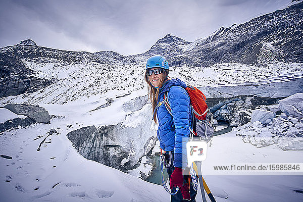 Smiling female mountaineer  Glacier Grossvendediger  Tyrol  Austria