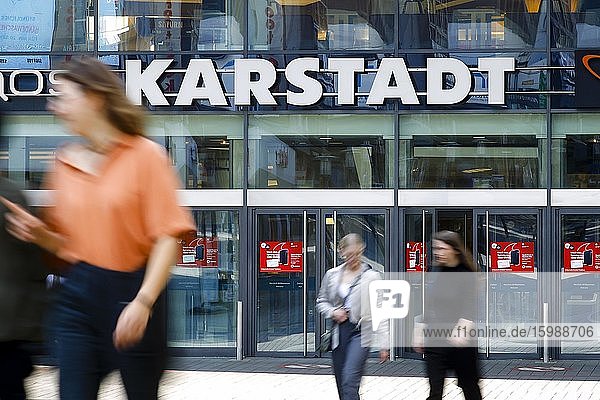 Passers-by in front of the entrance of the Galeria Karstadt Kaufhof store in the Limbecker Platz shopping centre  Ruhr area  Essen  North Rhine-Westphalia  Germany  Europe