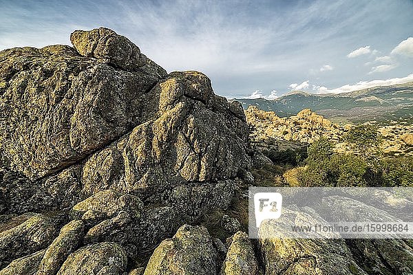 Granite at Tranco Cliffs and fog in The Pedriza Regional Park. Madrid. Spain. Europe.