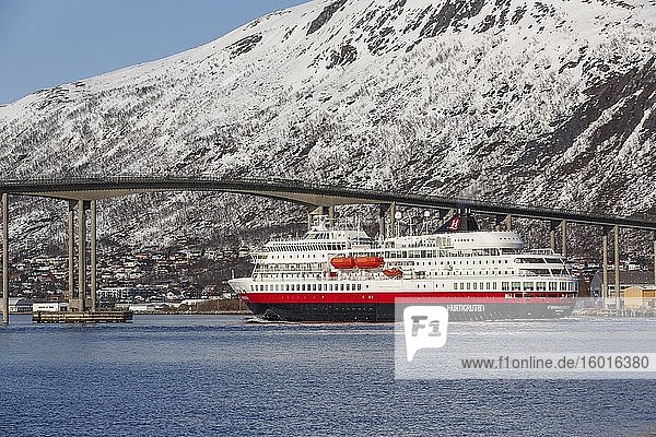 Hurtigruten vessel MS Finnmarken under the Tromsø Bridge Tromsøysund Tromsø Troms Norway Europe