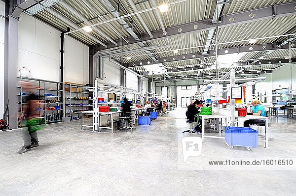 Workstations in industrial hall  interior  Germany  Europe