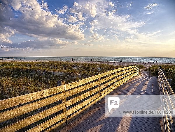 Walkway to Nokomis Beach and the Gulf of Mexico in Nokomis Florida in late afternoon light.