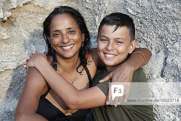 Smiling mother and son on vacation in salento  italy