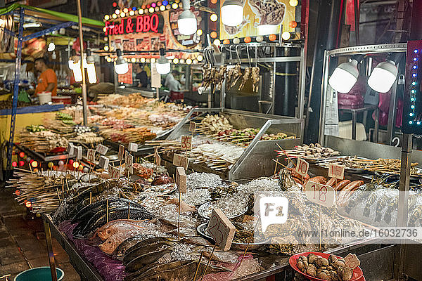 Fresh seafood for sale in Bukit Bintang food street at night in the capital city of Kuala Lumpur  Malaysia  Southeast Asia  Asia