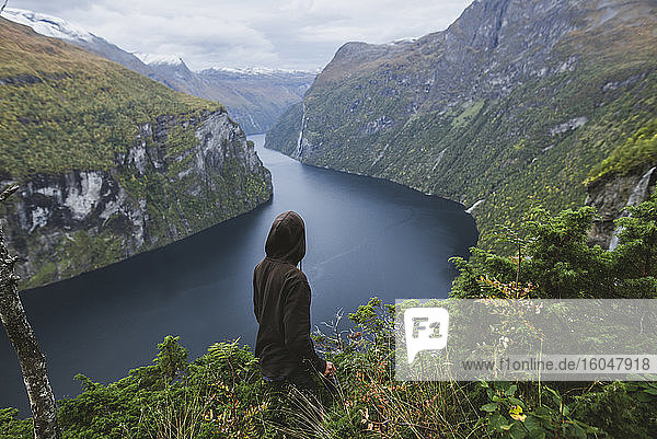 Norway  Geiranger  Man looking at scenic view of Geirangerfjord
