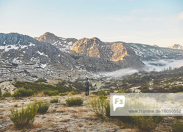 Man standing on landscape against rocky mountains  Leon  Spain