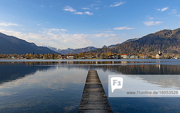 Germany  Bavaria  Rottach-Egern  Jetty on shore of Tegernsee with town in background