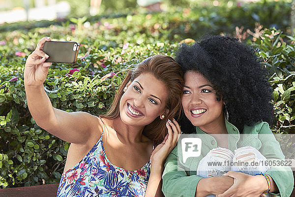 Girlfriends taking a selfie