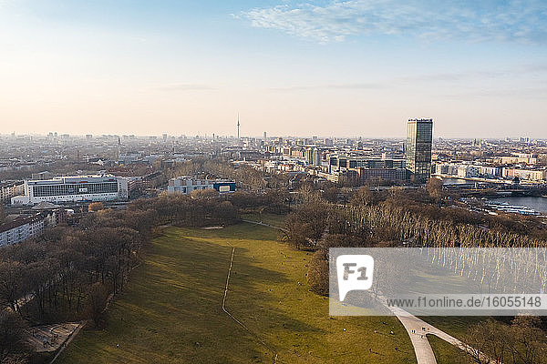 Germany  Berlin  Aerial view of Treptower Park in autumn with city buildings in background