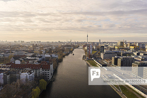 Germany  Berlin  Aerial view of Spree river canal and surrounding buildings at dusk