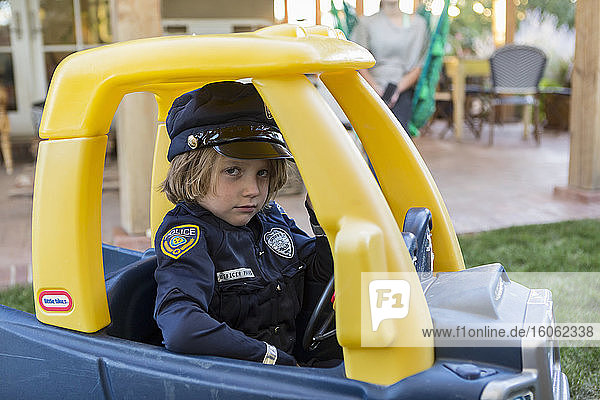 4 year old boy dressed as a police officer
