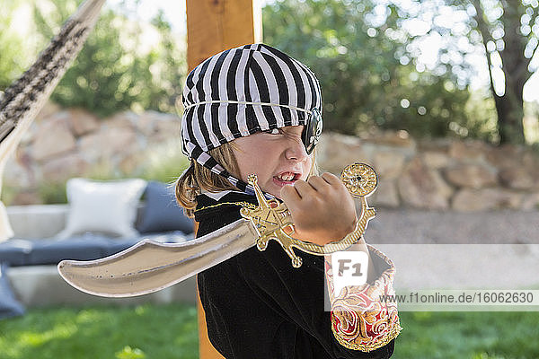 5 year old boy wearing pirate costume
