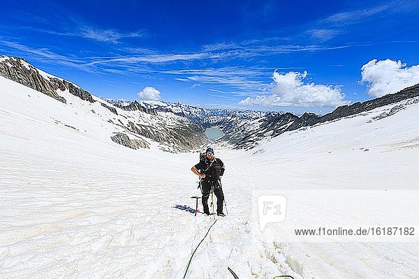 Mountaineer on the Oberaar glacier  behind Oberaarsee  Canton Bern  Switzerland  Europe