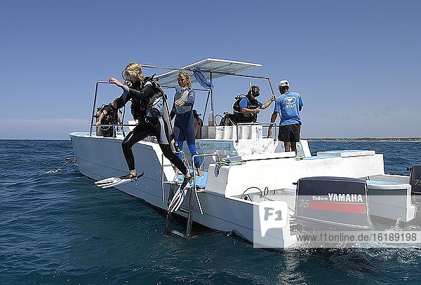 Diver jumps off the boat  Punta Cana  Dominican Republic  Central America