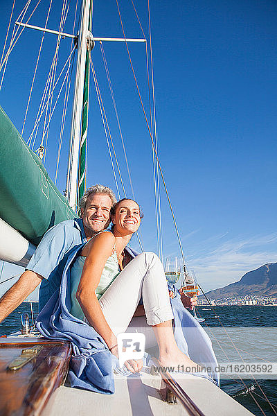 Couple on yacht with wine