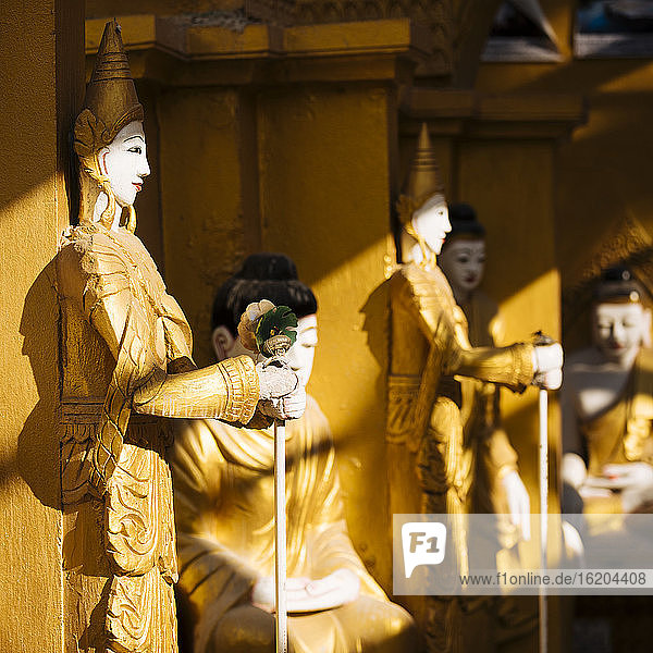 Statues at buddhist temple, Mandalay, Mandalay Region, Myanmar