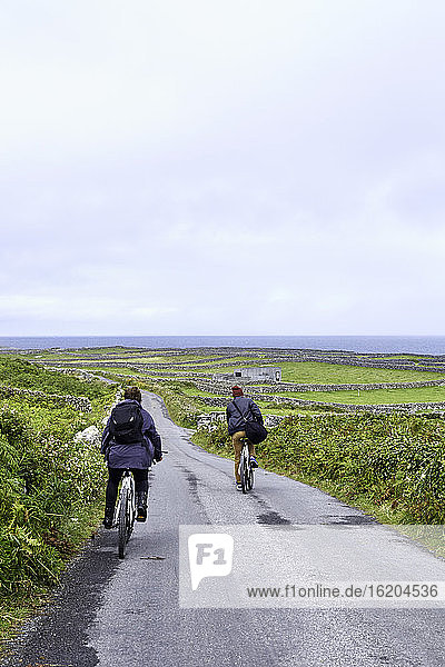 Cyclists on road  Inishmore  Ireland