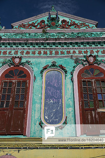 Turquoise colonial facade, Malacca, Malaysia