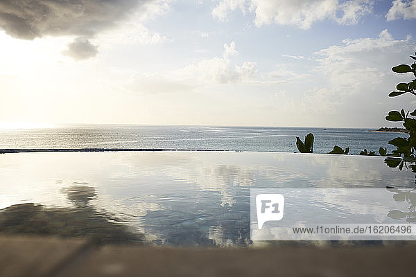 View of infinity swimming pool and sea, Saint Martin, The Caribbean