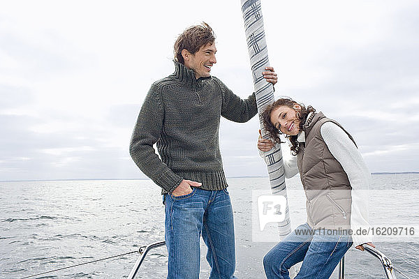 Germany  Baltic Sea  Lübecker Bucht  Young couple on sailing boat  portrait