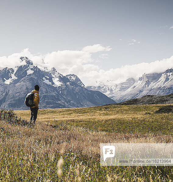 Man exploring Torres Del Paine National Park in Patagonia  South America