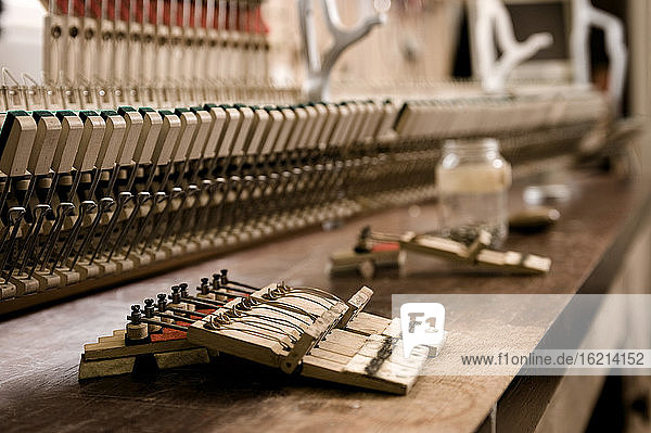 Germany  Bavaria  Piano keys for repairing at workshop  close up