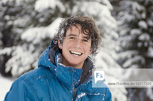 Austria  Salzburger Land  Altenmarkt-Zauchensee  Young man  laughing  portrait
