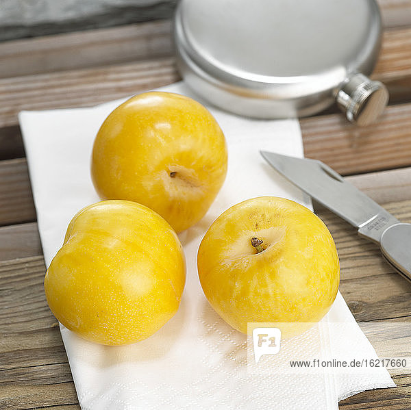 Yellow plums on napkin  close-up