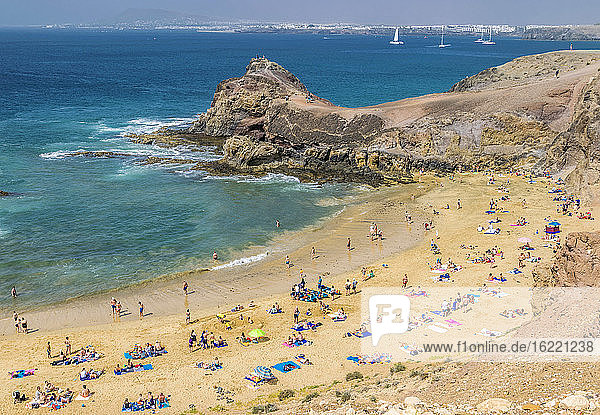 Spain  Canary Islands  Lanzarote Island  tourists on a beach