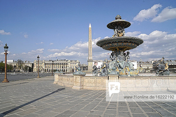 France Paris  8th arrondissement 20/03/20. No traffic on empty Place de la Concorde  due to the containment obligation decided by the French Government to fight the epidemic. 'Fontaine des mers' in foreground.