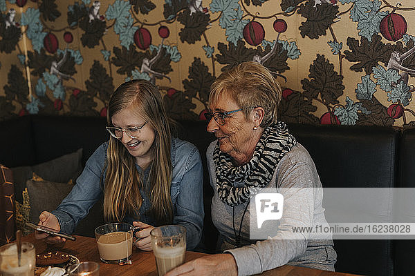 Women having coffee in cafe