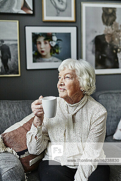 Senior woman holding mug
