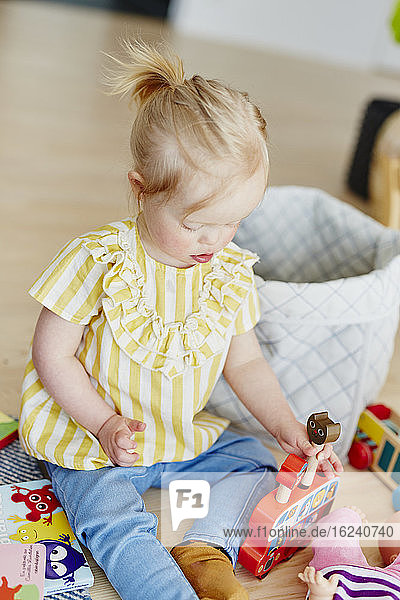 Girl playing with toys