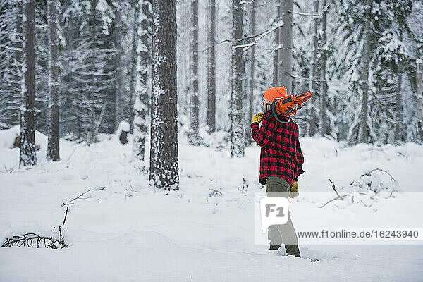 Lumberjack in forest