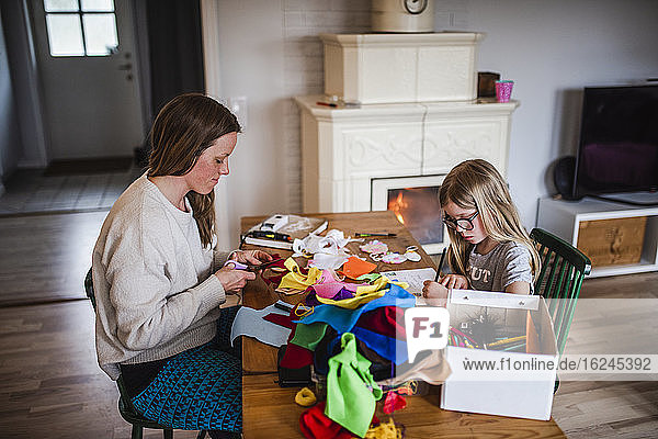 Mother and daughter doing craft