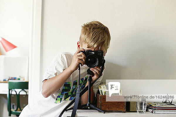 Boy photographing
